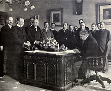 French Ambassador to the United States Jules Cambon signs the declaration of ratification of the peace treaty on behalf of Spain on May 1, 1899.