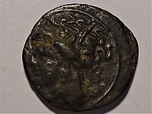 Bronze coin of Carthage, head of Tanit, late 4th century BC.