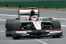 Karun Chandhok tog Hispania Racings första plats med en fjortonde plats i Australiens Grand Prix.  