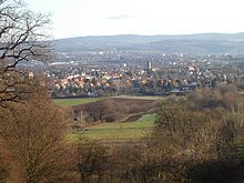 View from Bergpark Wilhelmshöhe at the New Waterfall to Kassel-Kirchditmold (with church; in the background the Kaufunger Forest; to the NE; 7 December 2003)