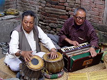 Bhajan singer with tabla and an Indian harmonium in the old town of Kathmandu