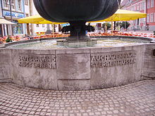Inscription on a fountain in the pedestrian zone of Speyer