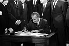 President Johnson signing the Civil Rights Act of 1968.