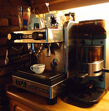 Coffee grinder and continuous coffee from a portafilter machine of the manufacturer La Cimbali