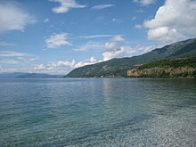 Lake Ohrid is shared by Northern Macedonia and Albania. It is the largest lake in the country, one of the largest in the Balkan Peninsula and one of the oldest on earth.