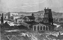 De nasleep van de aanval zoals weergegeven in Harper's Weekly. De verbrande ruïnes van het Eldridge House staan vooraan.  