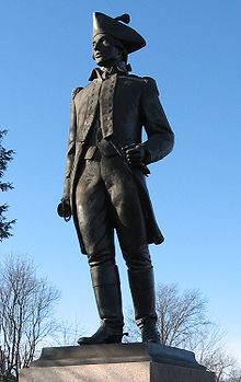 En statue af Loammi Baldwin i Woburn, Massachusetts, som blev repareret i efteråret 2007 for at erstatte det manglende sværd og renset.