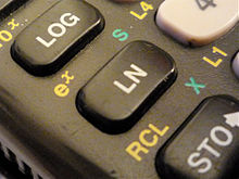 Operating elements on a pocket calculator. The LOG key stands for the logarithm to base 10, LN calculates the natural logarithm to base e. In addition, the second assignment of the respective keys is the corresponding inverse function (yellow labelling above each), the exponential function to base 10 or e.