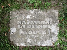 Memorial stone of the former Amish community in Nassau at the Mennokate