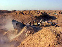 Discovery of a buried Iraqi Mig-25 fighter aircraft in al-Taqqadum in August 2003.