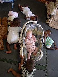 Six children at the Ministry of Hope Nursery in Lilongwe, Malawi, Southeast Africa. The child with albinism in the middle was abandoned by his father. The mother died during childbirth and the child was believed to be bewitched.