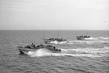 Three British motor torpedo boats return from searching for German fast boats near Cherbourg.