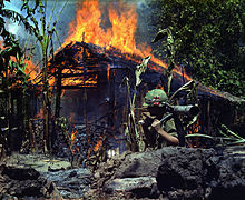 Burning Vietcong camp in My Tho, Vietnam