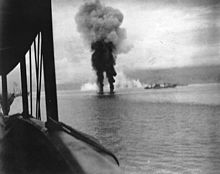 Rising smoke from two downed Japanese planes