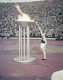 Paavo Nurmi at the lighting of the Olympic flame