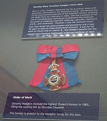 The British monarch awards medals like the Order of Merit...