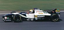 Pierluigi Martini alla guida della Minardi al Gran Premio di Gran Bretagna del 1995.