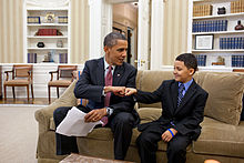 A child visits US President Barack Obama as part of Make-A-Wish