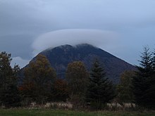 Cloud formation due to the overflow of a mountain peak