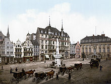 Market place with old town hall (right), photochrome print around 1900