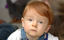 Toddler with reddish hair