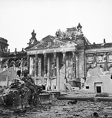 The Reichstag building in Berlin four weeks after the end of the war