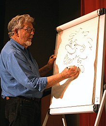 Rolf Harris dibujando un autorretrato de Rolfaroo  