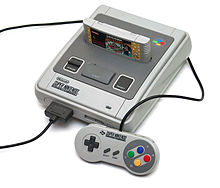 The SNES with Super Mario All Stars module inserted.