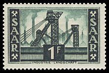 The mining and steel industry was formative for the country's recent history: Towers and blast furnaces on a stamp from 1953