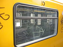 Scratchings at a window of the Berlin subway