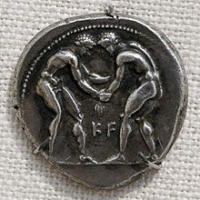 Lutadores em uma moeda por volta de 400 a.C.