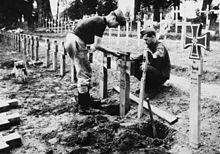 German soldiers laying out a "heroes' cemetery".