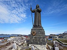 The statue of Hans Egede, the founder of Nuuk, on the hill by the church