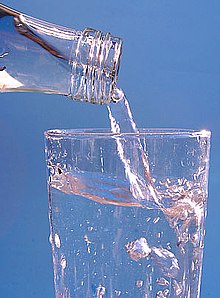 Drinking water from the glass bottle