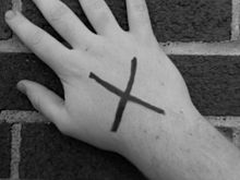 The "X" on the back of the hand as a symbol for Straight Edge