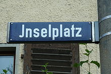 Street sign at the Inselplatz in Jena with J instead of I in the initial sound