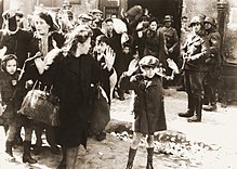 Warsaw Ghetto Uprising 1943. The photograph of the boy, taken from the Stroop report, is one of the most famous photographs of the Holocaust.
