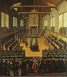 De Synode van Dort. De Arminianen zitten aan de tafel in het midden.