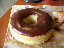 En Tim Hortons donut med chokladdipp