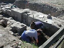Excavation of a ground monument (in-situ archaeology)