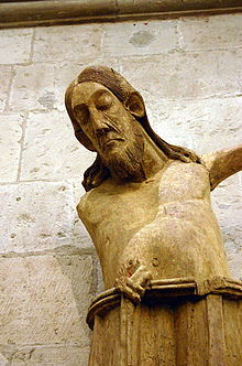 Uma estátua quebrada de Jesus crucificado, vinda da Alemanha por volta de 1000 d.C.