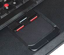 Touchpad, called UltraNav on ThinkPad notebooks, with TrackPoint (top left, red).