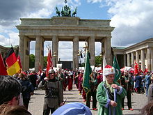 Janissary procession through the Brandenburg Gate on Turkish Day in Berlin