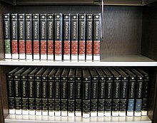 The internationally best-known modern encyclopaedia in print: Encyclopaedia Britannica, 1990s. The first volume, with a green stripe, is the systematic Propaedia ("Outline of Knowledge") with its references to Micropaedia and Macropaedia. Then follows, with red stripes, the Micropaedia ("Ready Reference"), a classic short-article encyclopedia with about 65,000 articles. The Macropaedia ("Knowledge in Depth"), lower board, covers major topics in about seven hundred articles. Finally, behind the Macropaedia, with blue stripes, is the two-volume alphabetical index with references to Micropaedia and Macropaedia.