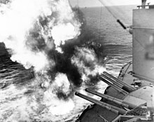 USS Nevada fires her guns at German coastal positions to secure Utah Beach landings