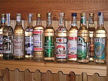 Vodka bottles of different brands in the vodka museum in Verkhnye Mandrogi