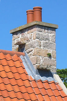 Jersey house chimney with two ceramic chimney pots