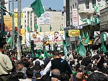 Hamas election rally in Ramallah with slain models Yasin and Rantisi on a poster