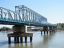 Since 2000, the single-track temporary bridge has replaced the Žeželj Bridge on the Belgrade-Budapest route in Novi Sad, which was destroyed by bombing in 1999.