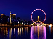 Tianjin Eye - the 120 m high Ferris wheel above the Yongle Bridge at Hai He, 2009